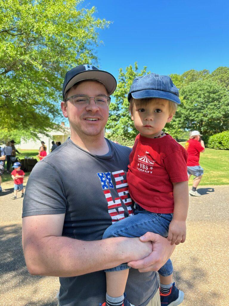 father and son at American Village