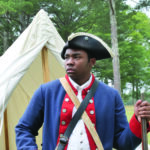 colonial soldier at American Village